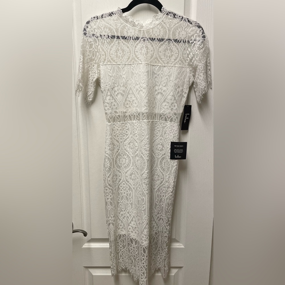 White Lace mid length dress.